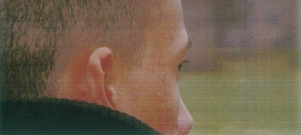 A close-up shot of the side of a person's face