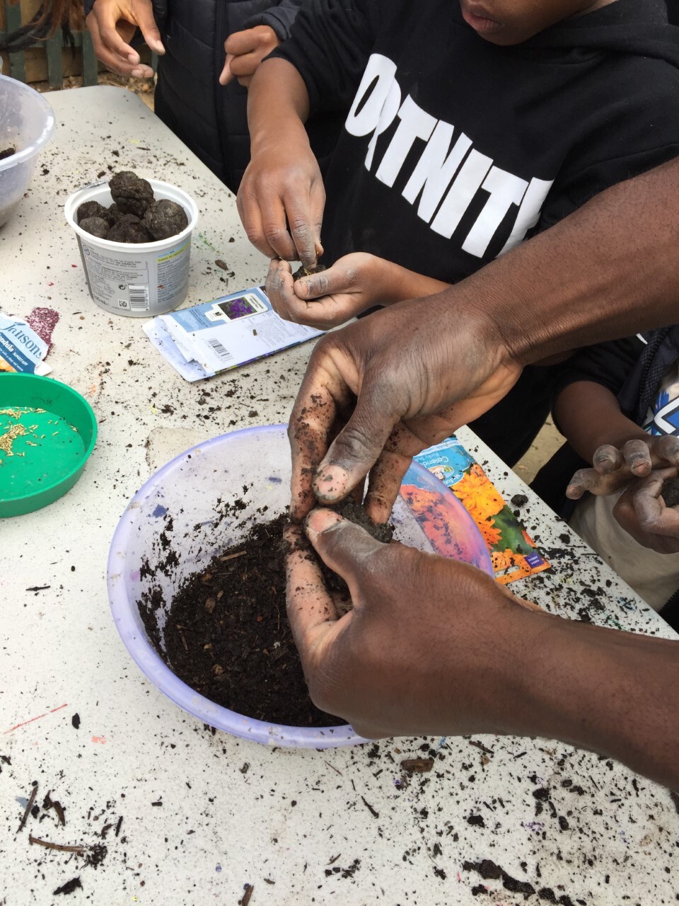 Programme participant feeling soil.