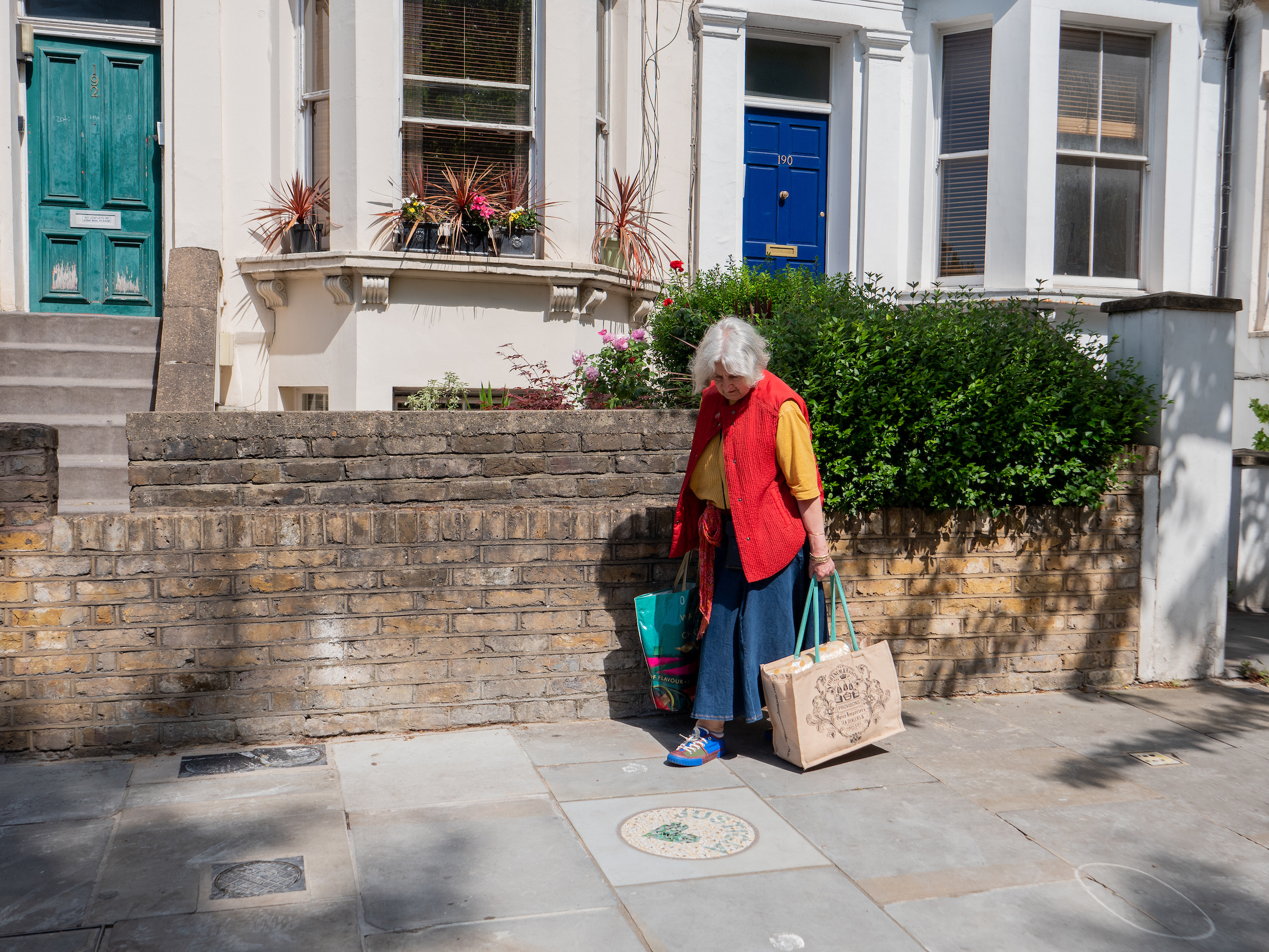 Walking as One, installation on the streets of North Kensington, London, as part of the Grenfell Memorial Community Mosaic. Photo by ACAVA Shoots (Andreia Sofia)