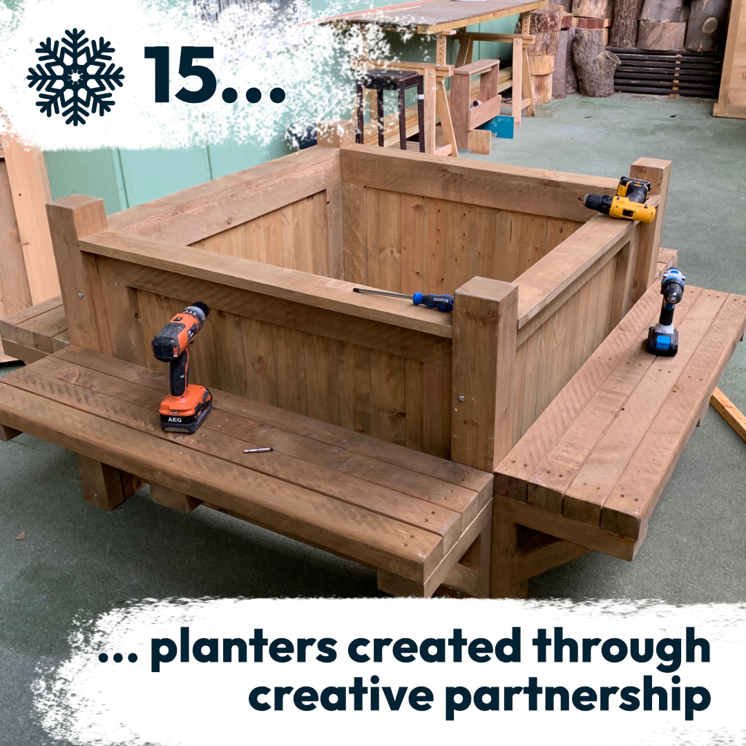 Large wooden planter being build at our Maxilla Men's Shed with Shedders and Idverde